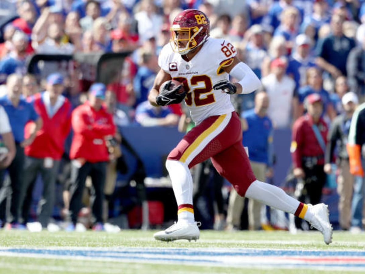 Washington Commanders tight end Logan Thomas (82) warms up before