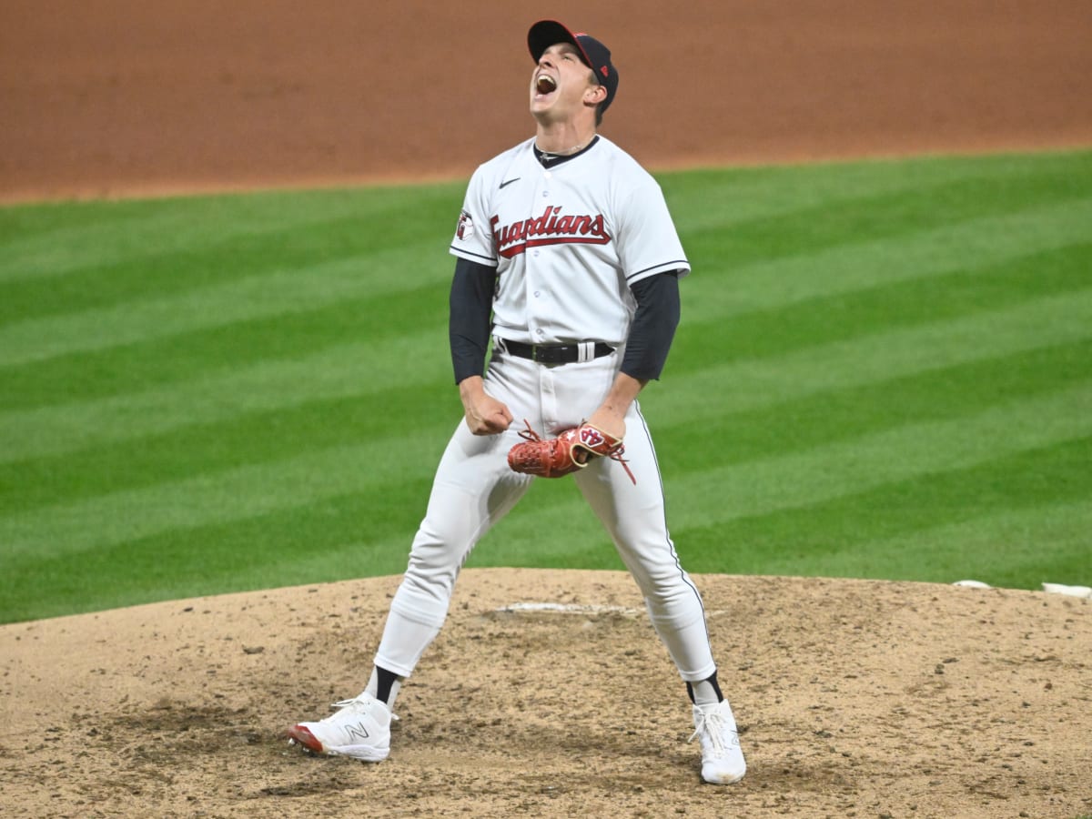 Cleveland Guardians relief pitcher James Karinchak celebrates after  completing the eighth inning of a baseball game against the New York  Yankees in Cleveland, Monday April 10, 2023. (AP Photo/Phil Long)