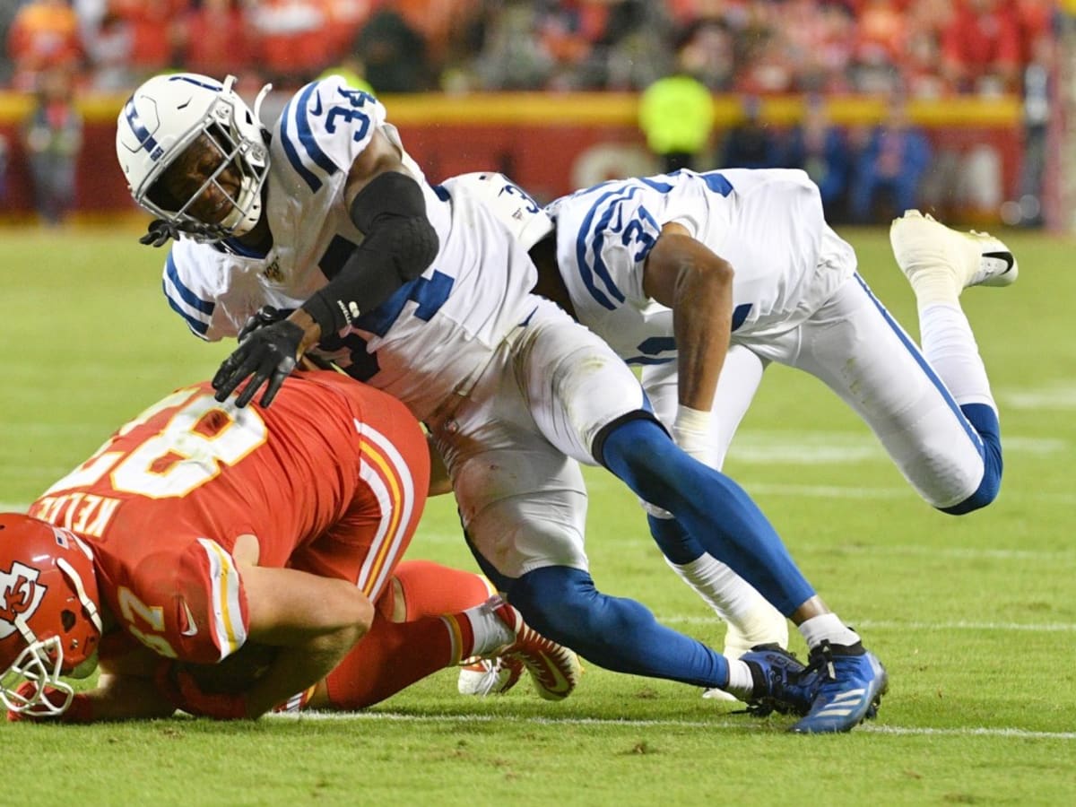 Travis Kelce shoves, then hugs coordinator Eric Bieniemy