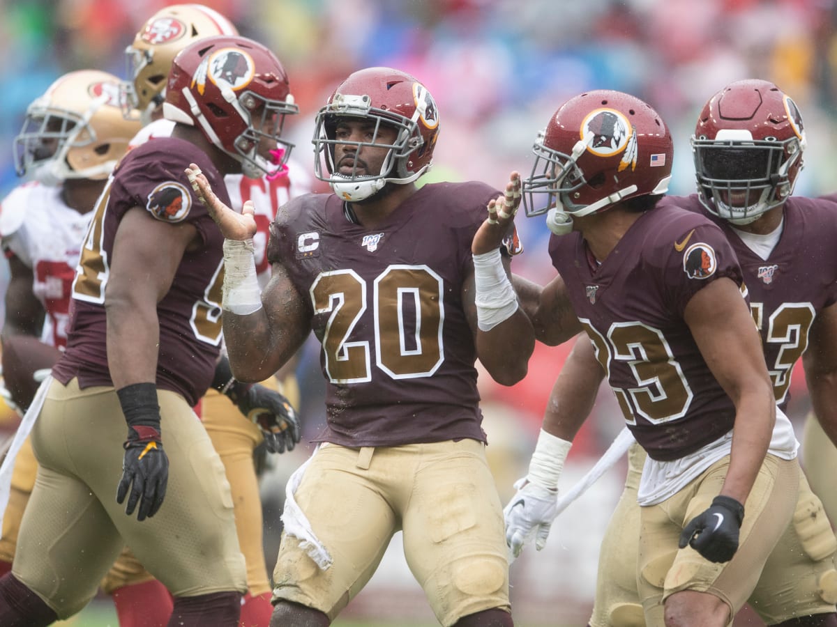 Landon Collins received signed Sean Taylor jersey from Dan Snyder