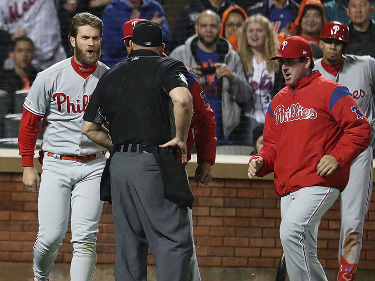 Phillies' Bryce Harper ejected after charging at Rockies' dugout - ESPN