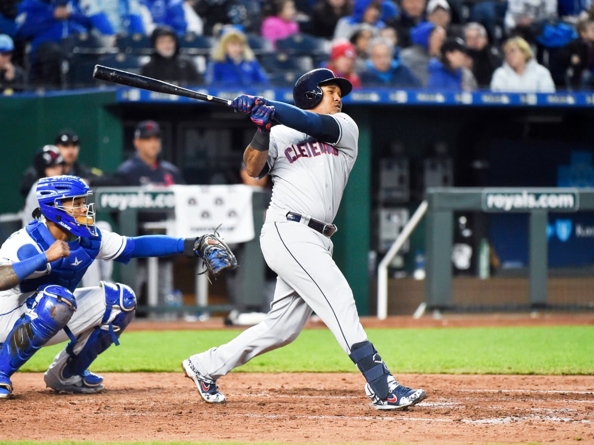 Cleveland Guardians' Jose Ramirez begins his swing as Minnesota