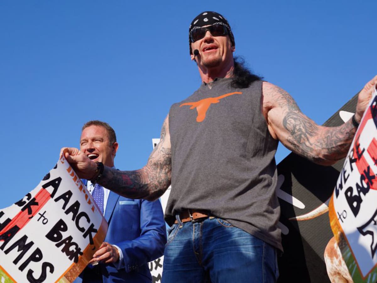 WWE's Undertaker talks Cowboys, Longhorns fandom; what it meant to be part  of Salute to Service game