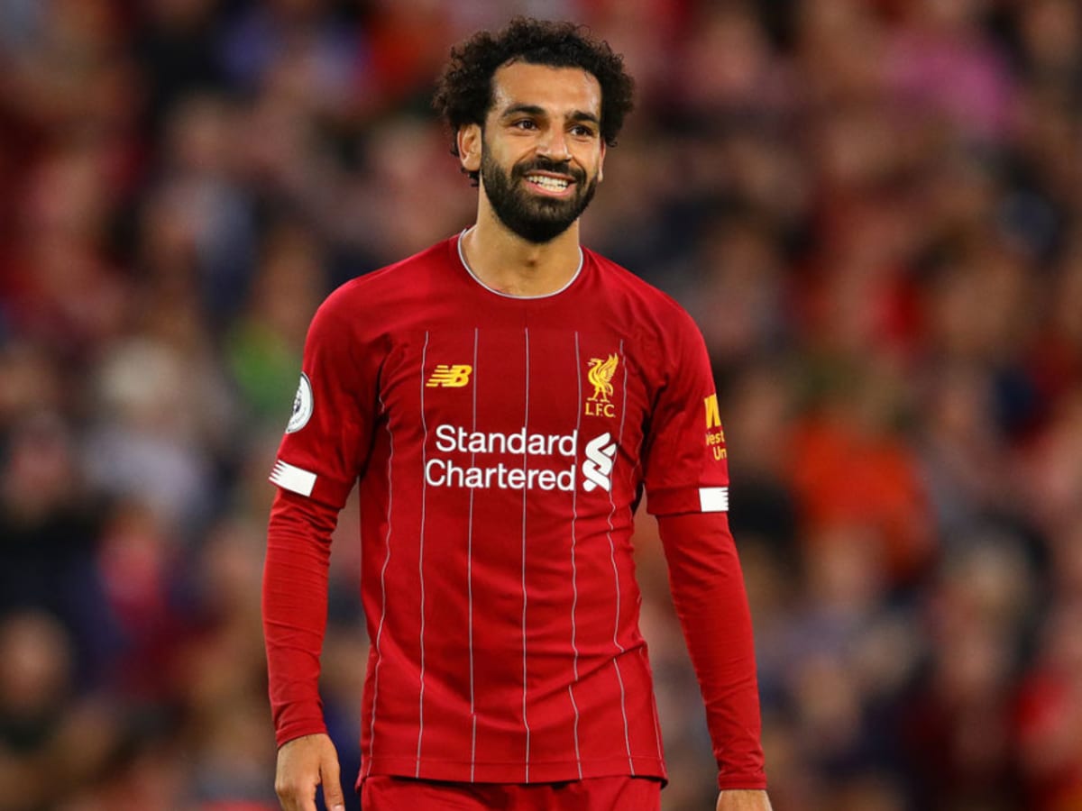 Mohamed Salah: Liverpool forward makes young fan cry by giving him his shirt  after Napoli clash