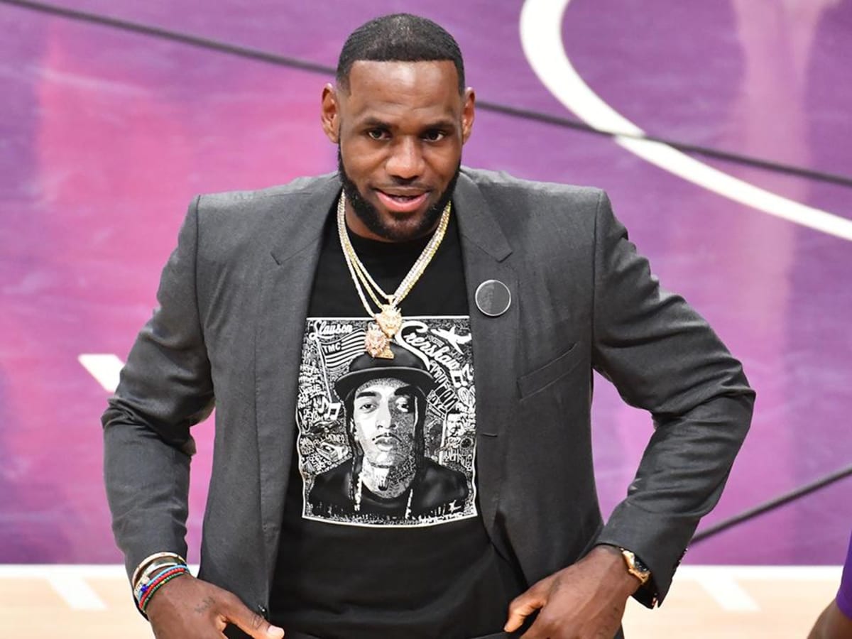 NBA Buzz - LeBron James out here wearing a Crenshaw Nipsey Hussle  customized Lakers jersey! 🔥👑
