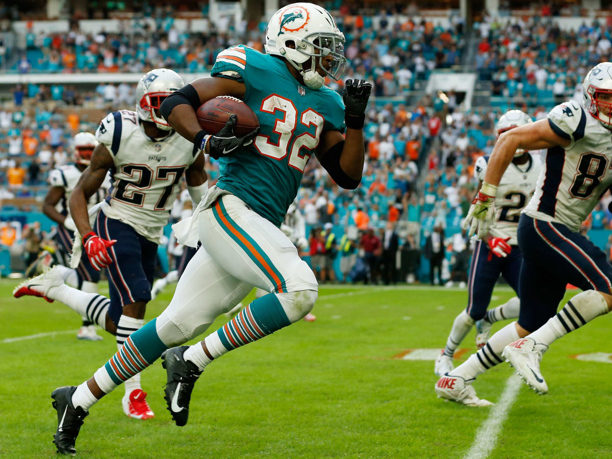 Dolphins beat Patriots on last-second lateral fiesta, touchdown