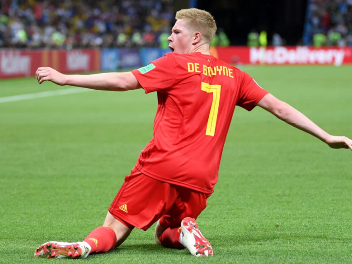 Kevin De Bruyne of Belgium holds a ball in his hand during the