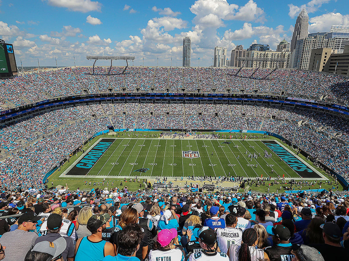 Carolina Panthers players push owner David Tepper for grass field