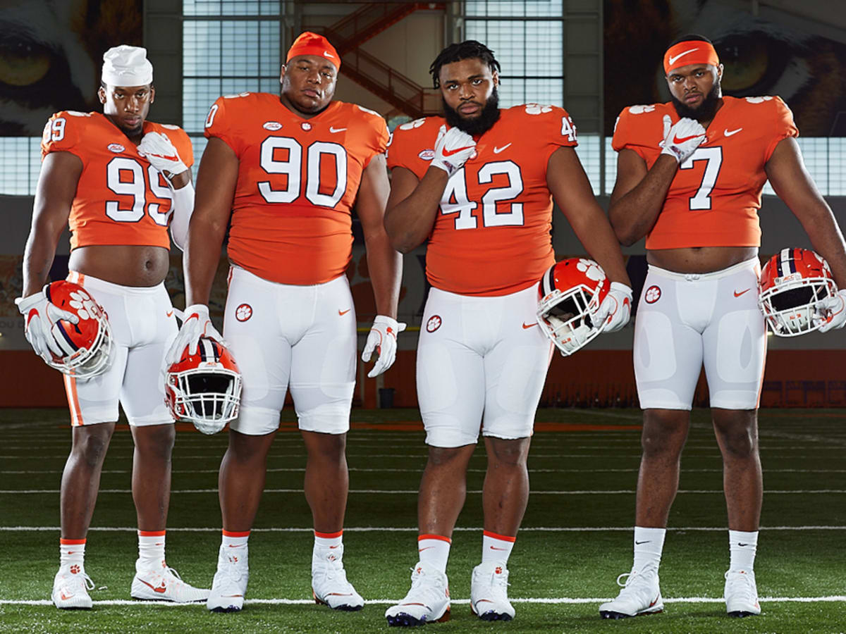 Photo: Christian Wilkins from Clemson receives a jersey from NFL