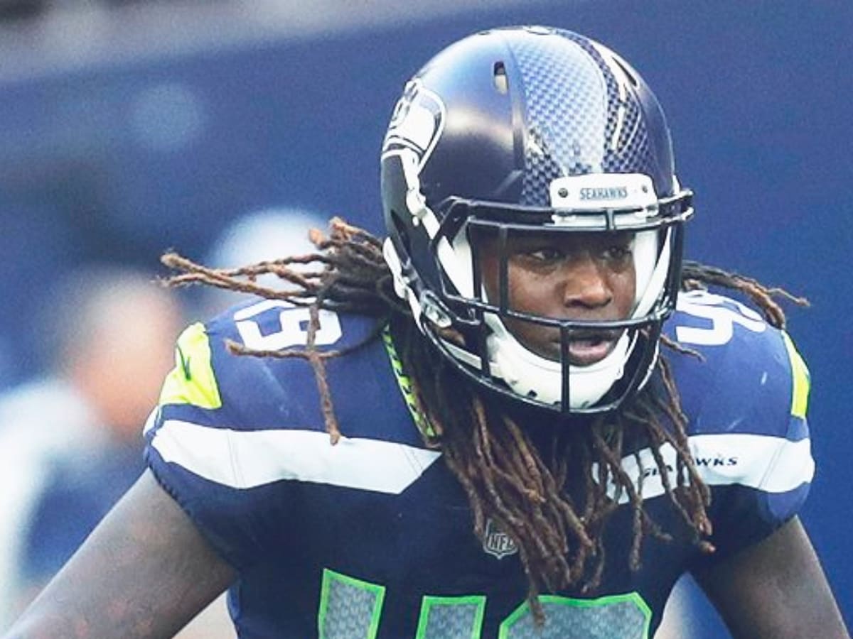 Los Angeles, CA, USA. 11th Nov, 2018. Seattle Seahawks outside linebacker  Shaquem Griffin (49) and Seattle Seahawks cornerback Shaquill Griffin (26)  show off their grills during the NFL Seattle Seahawks vs Los