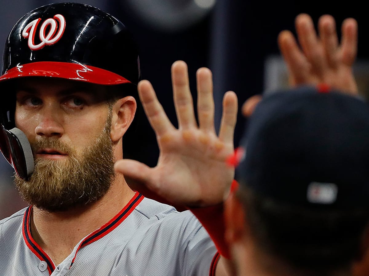 Harper's HR gives Nationals 8-6 win over Braves