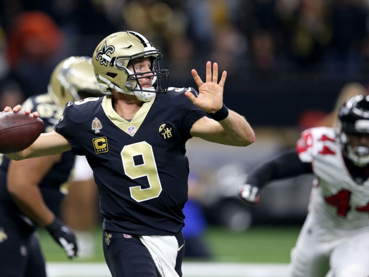 Drew Brees and the Saints toast a win over the Falcons with turkey legs 