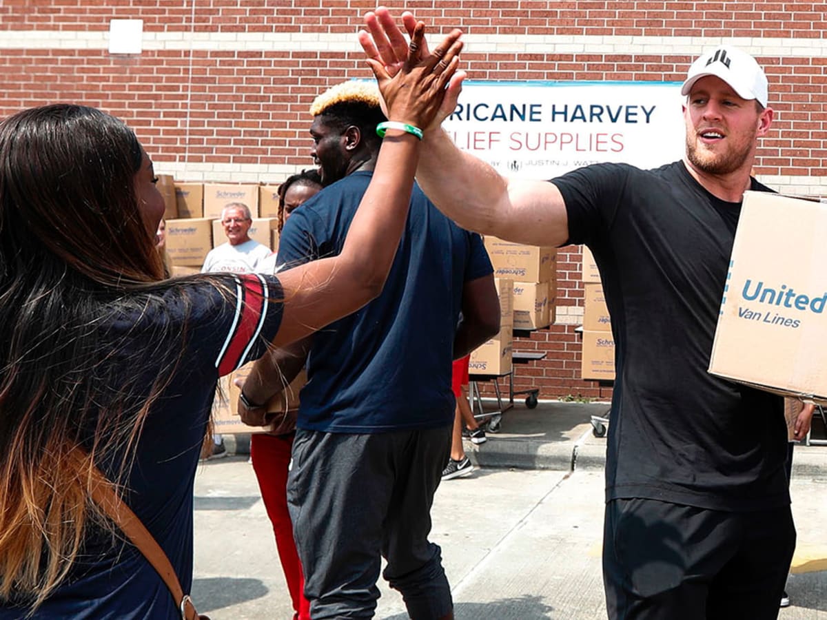 J.J. Watt of Houston Texans tosses first pitch at Game 3 of World