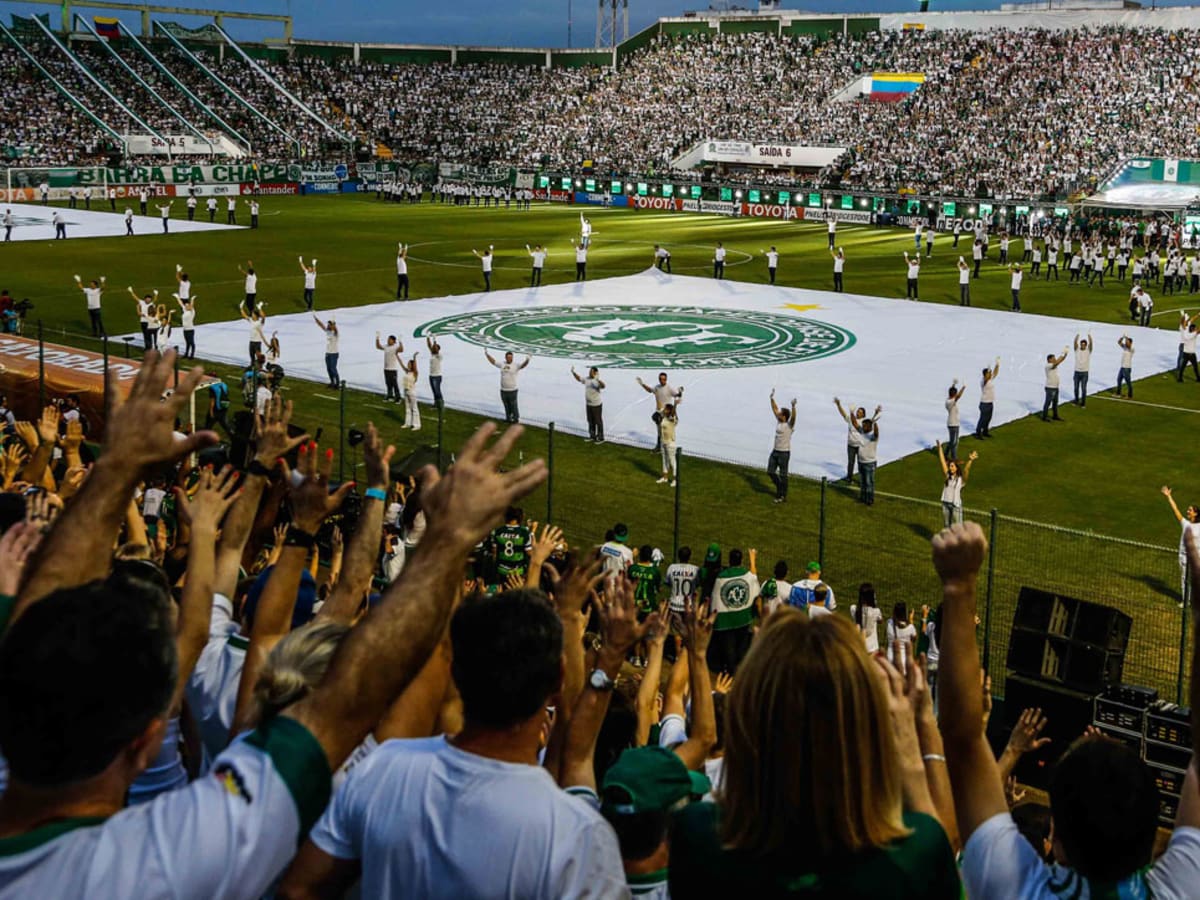 Fans of Atletico Nacional celebrate at the end of a second leg