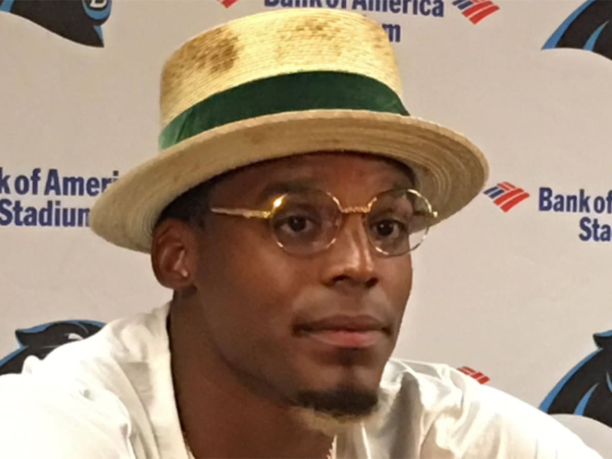 Cam Newton wore a huge hat and bleached beard to his first training camp  presser