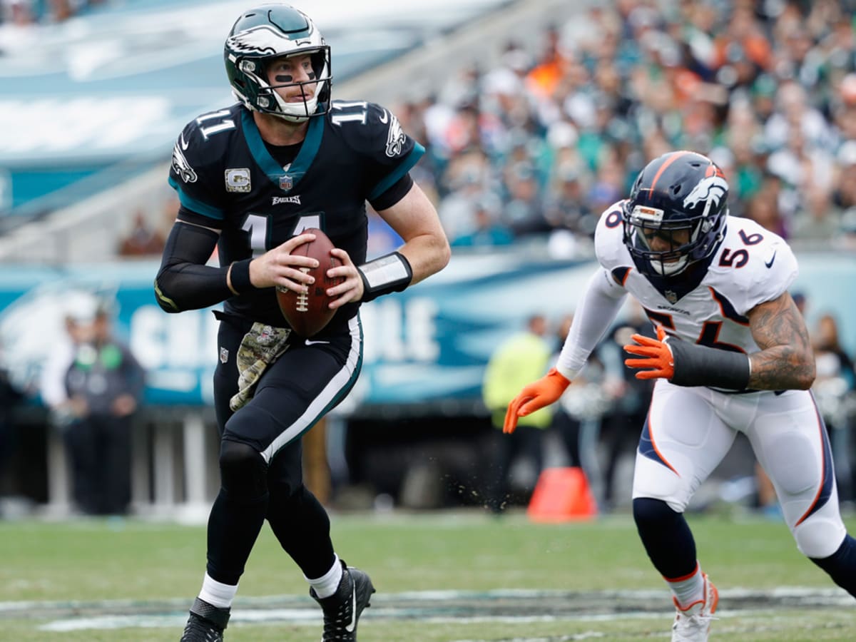 Prior to the Eagles first home game Carson Wentz leads a prayer