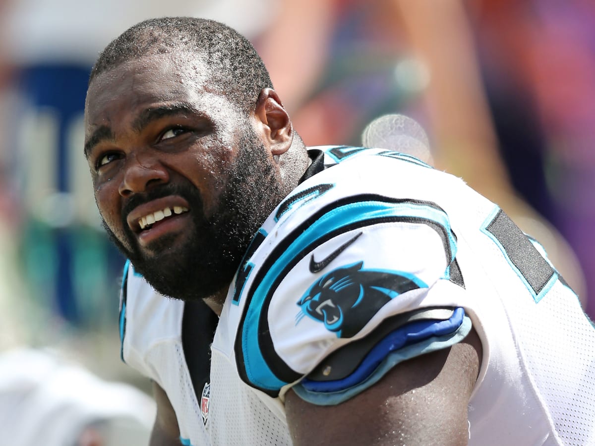 Michael Oher blindsides Uber driver - Cat Scratch Reader