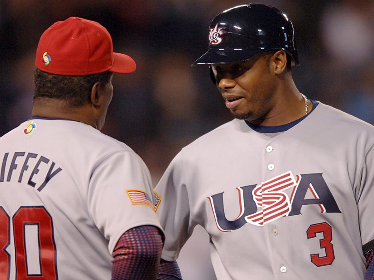 Happy Father's Day! Here's Ken Griffey Jr. and his dad hitting