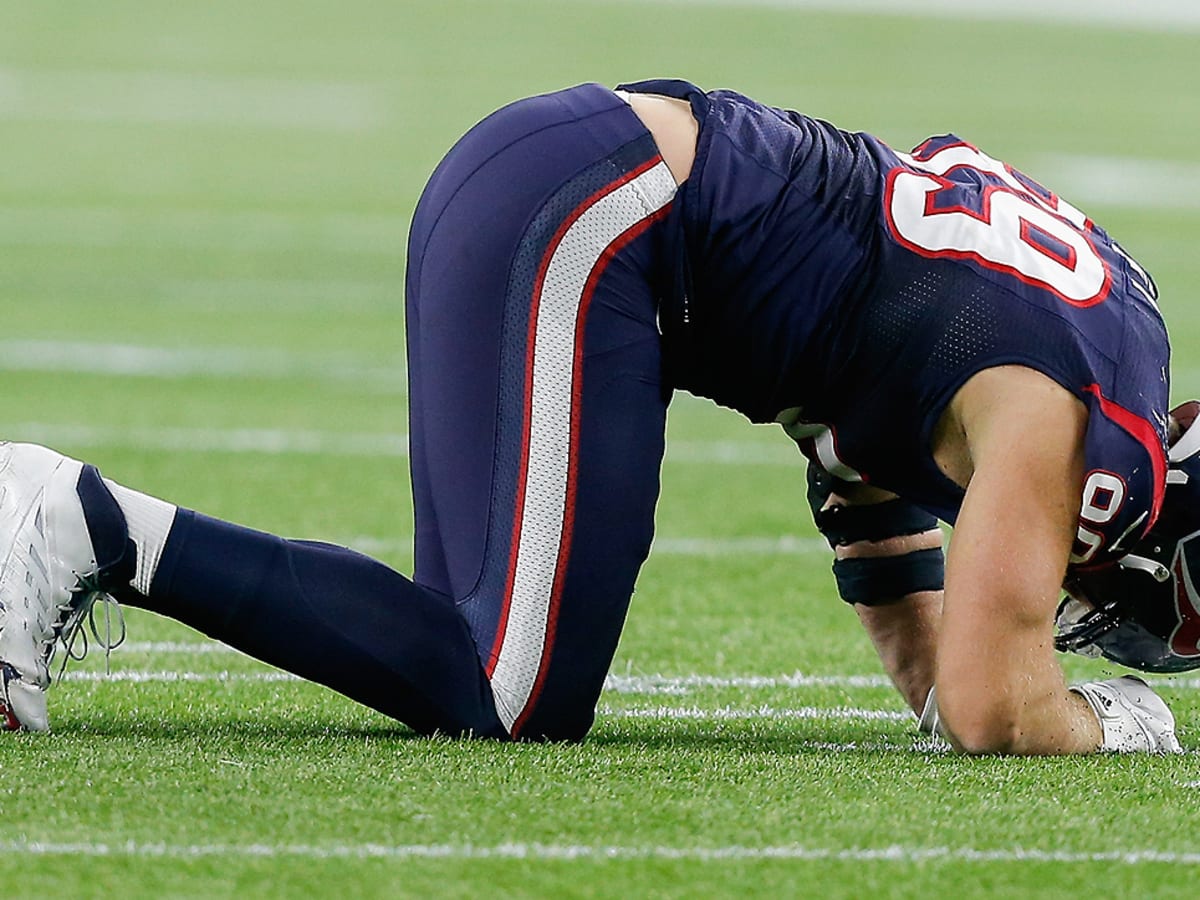 Texans' J.J. Watt limited in practice with hip injury