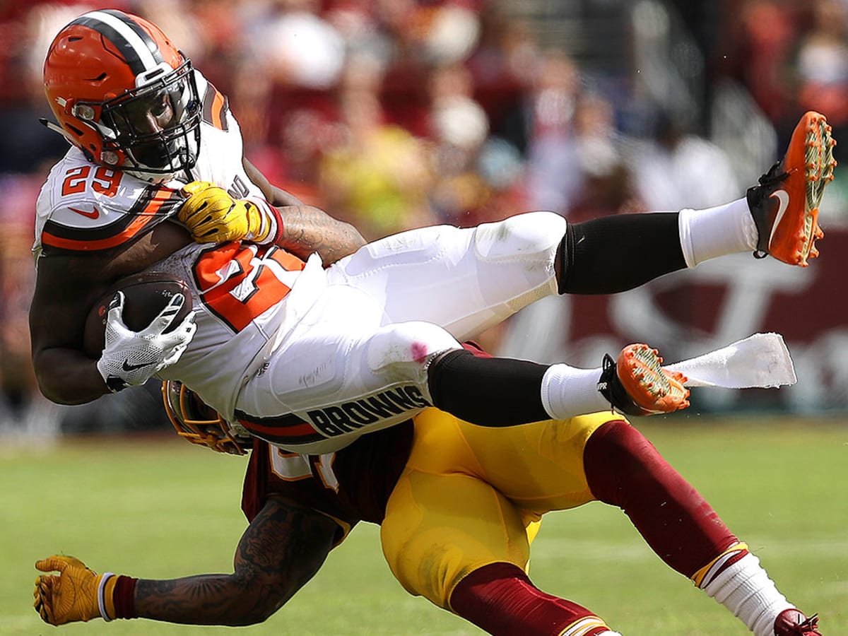 Duke Johnson stiff-arms would-be tackler