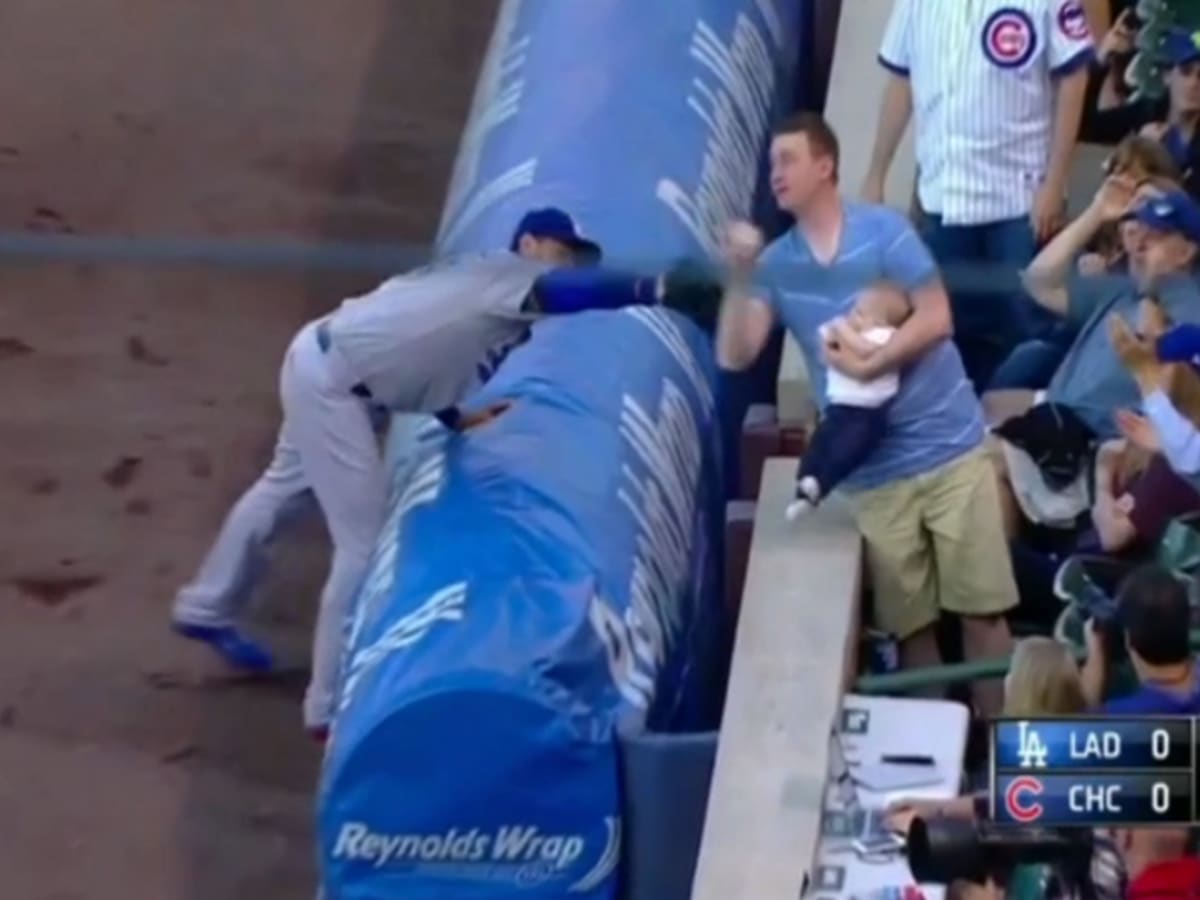 Tuesday's MLB: Mets fan makes HR catch with baby in hand; Reds