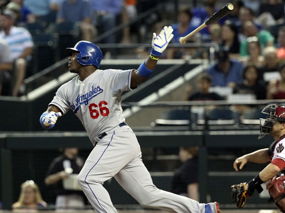 Los Angeles Dodgers' Yasiel Puig waits for his turn to bat with