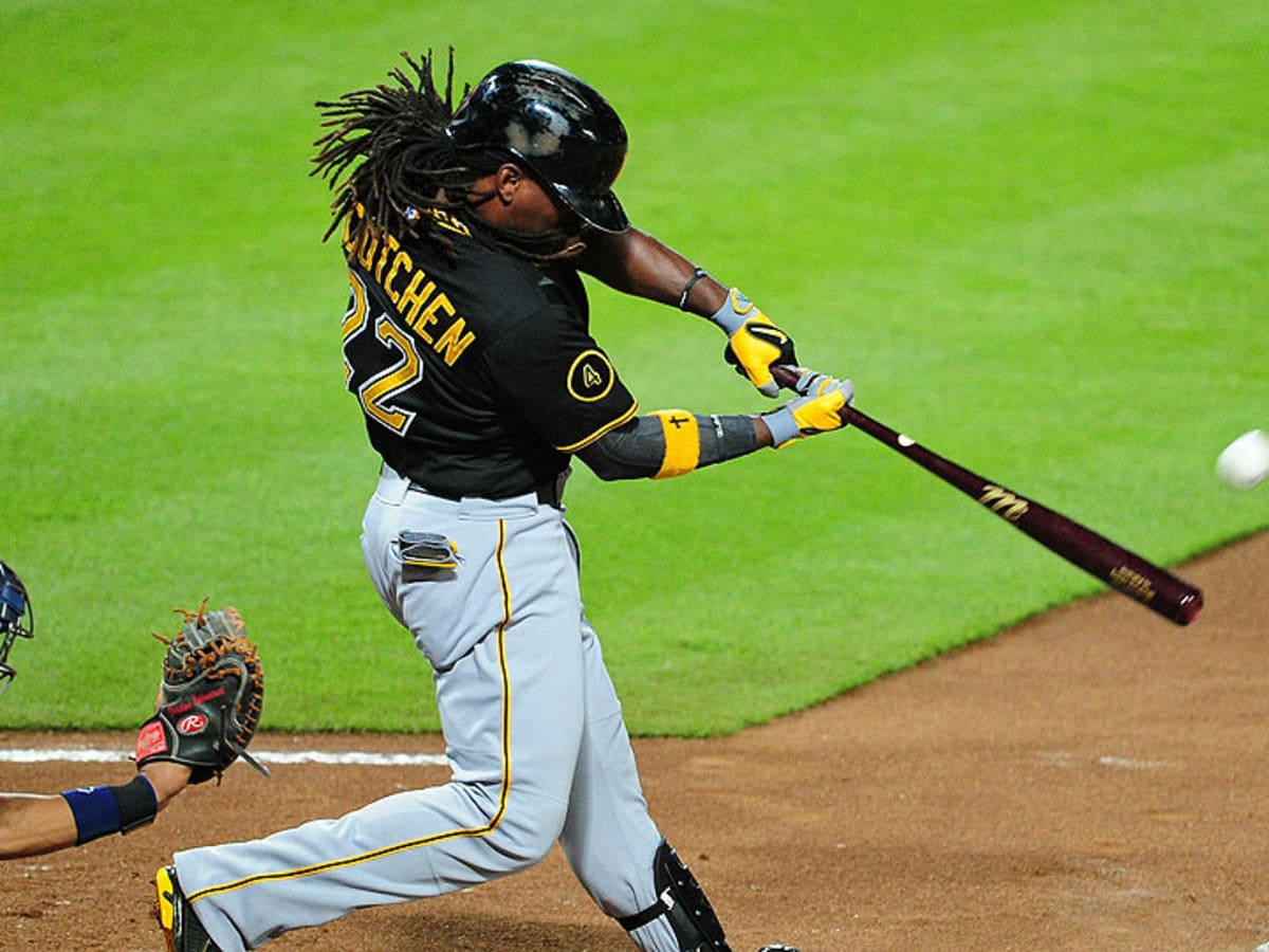 Martin powers Pirates past Reds in NL wild card