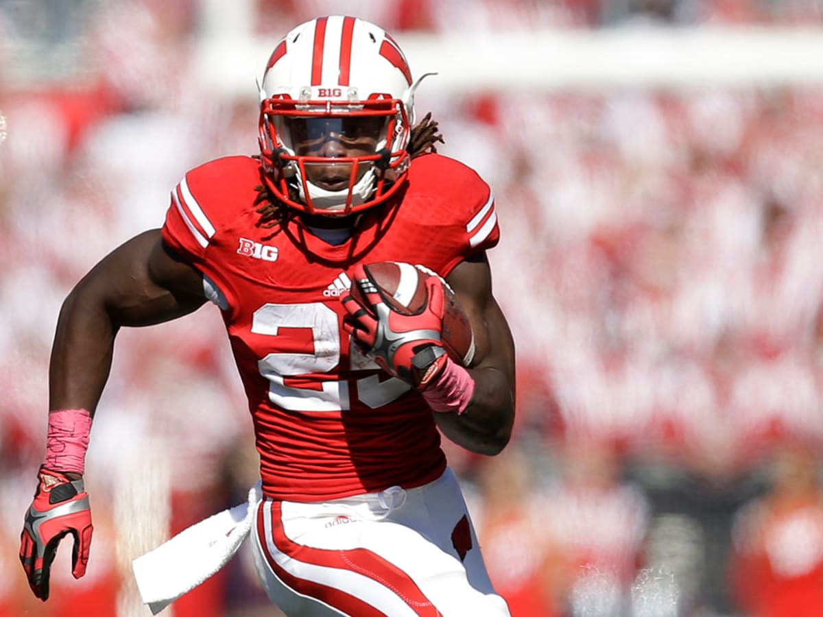 Melvin Gordon Wisconsin Badgers Unsigned Stiff-Arm Photograph