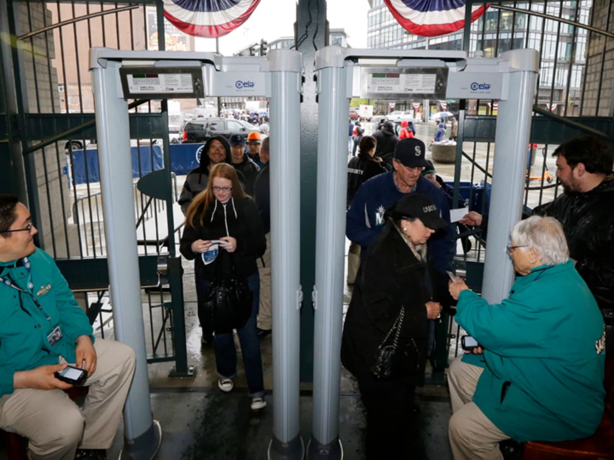 Fans go through metal detectors at Yankee Stadium