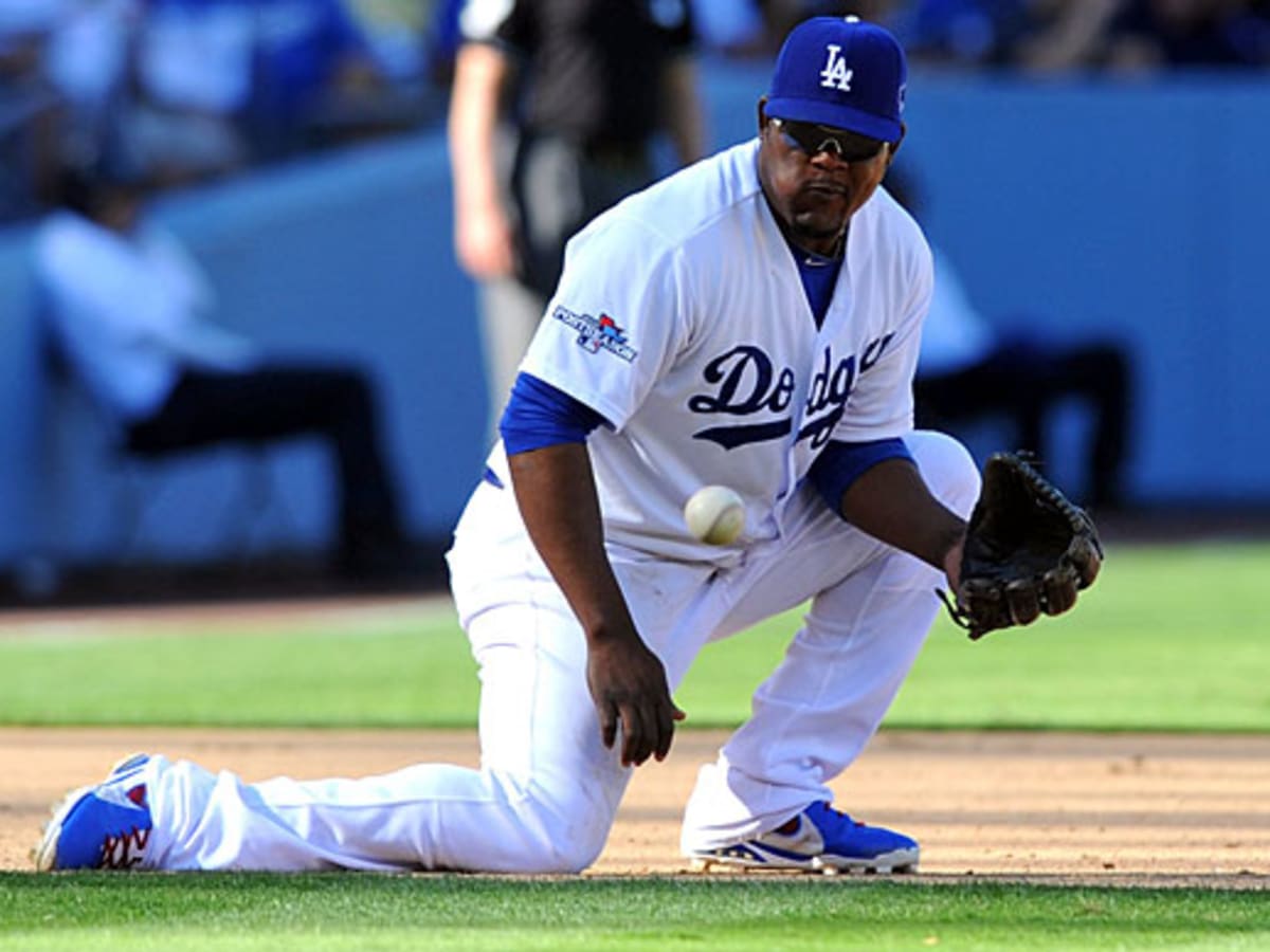 Hanley Ramirez and Yasiel Puig MANHANDLE Juan Uribe in the dugout 