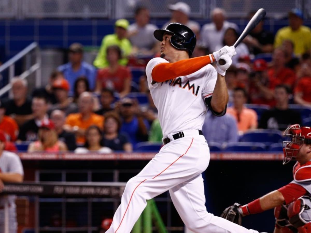 Miami Marlins right fielder Giancarlo Stanton reacts after