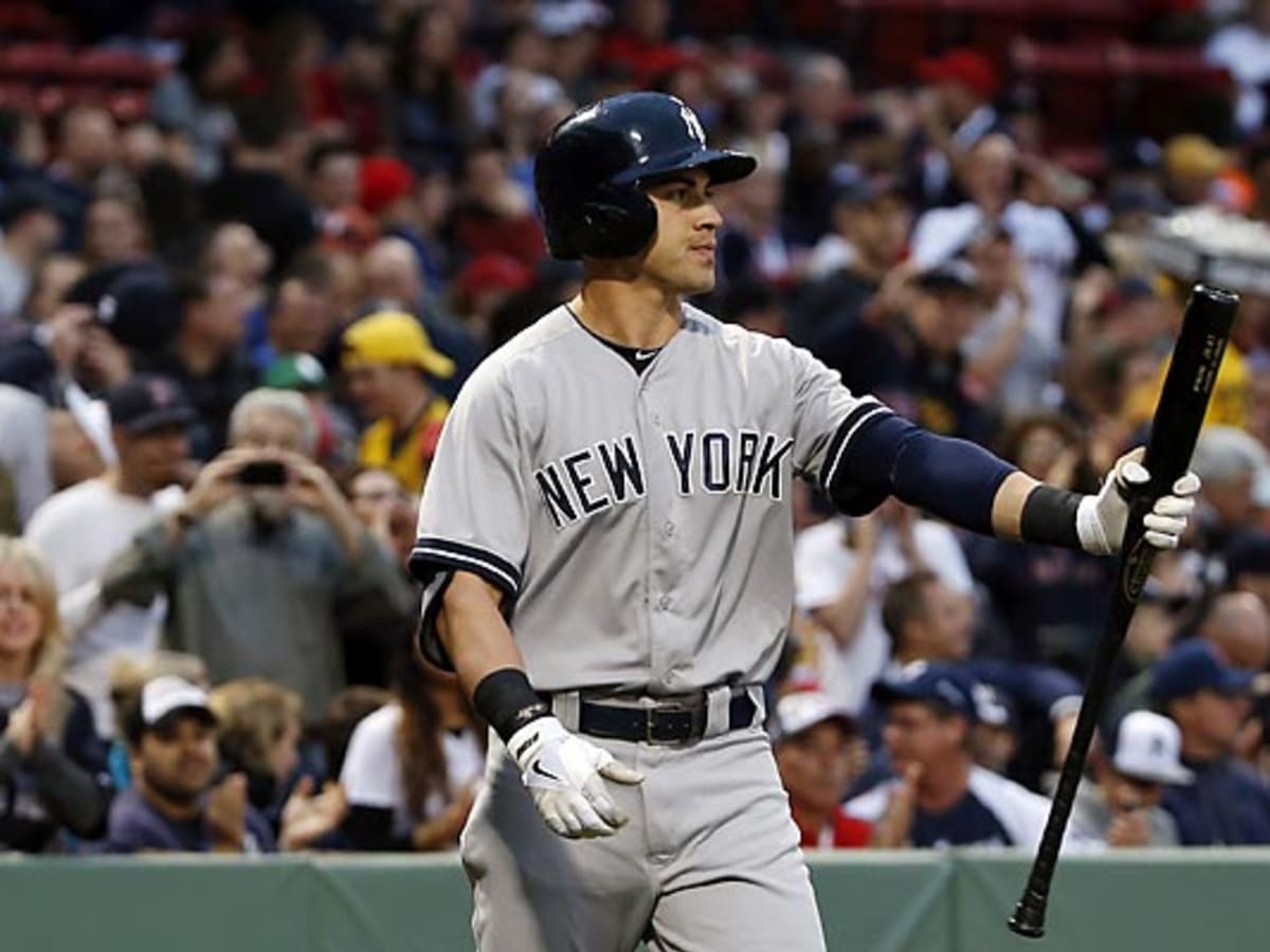 New York Yankees' Jacoby Ellsbury hits an RBI-single off Cleveland
