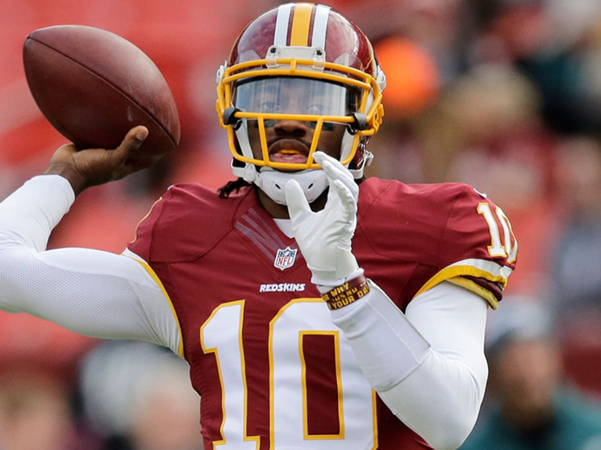 Redskins' RG3 limited with sprained shoulder