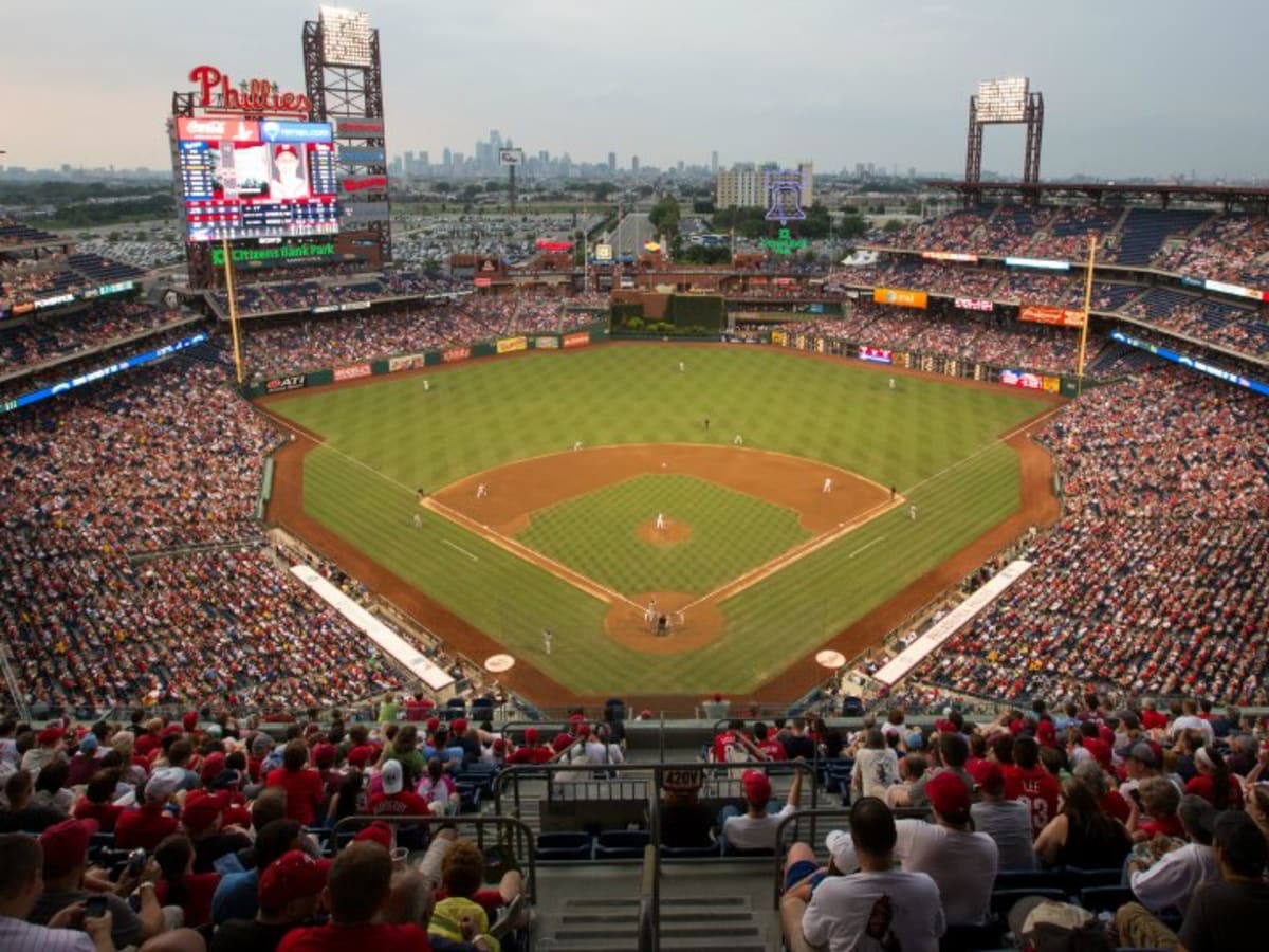 A ninth-inning rally fuels a 3-2 Phillies win over the Reds and revives a  packed Citizens Bank Park