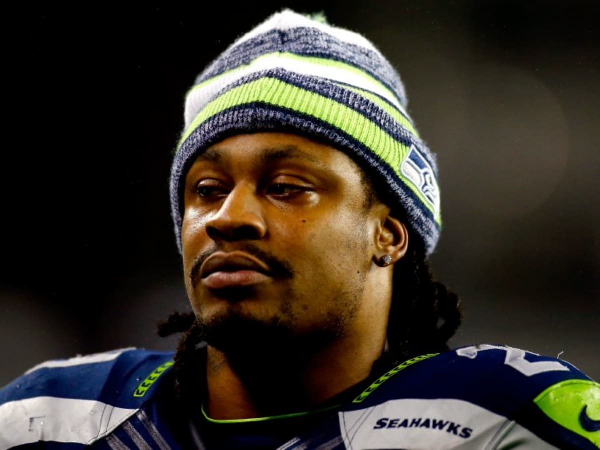 Marshawn Lynch Stages Mock Press Conference for Skittles