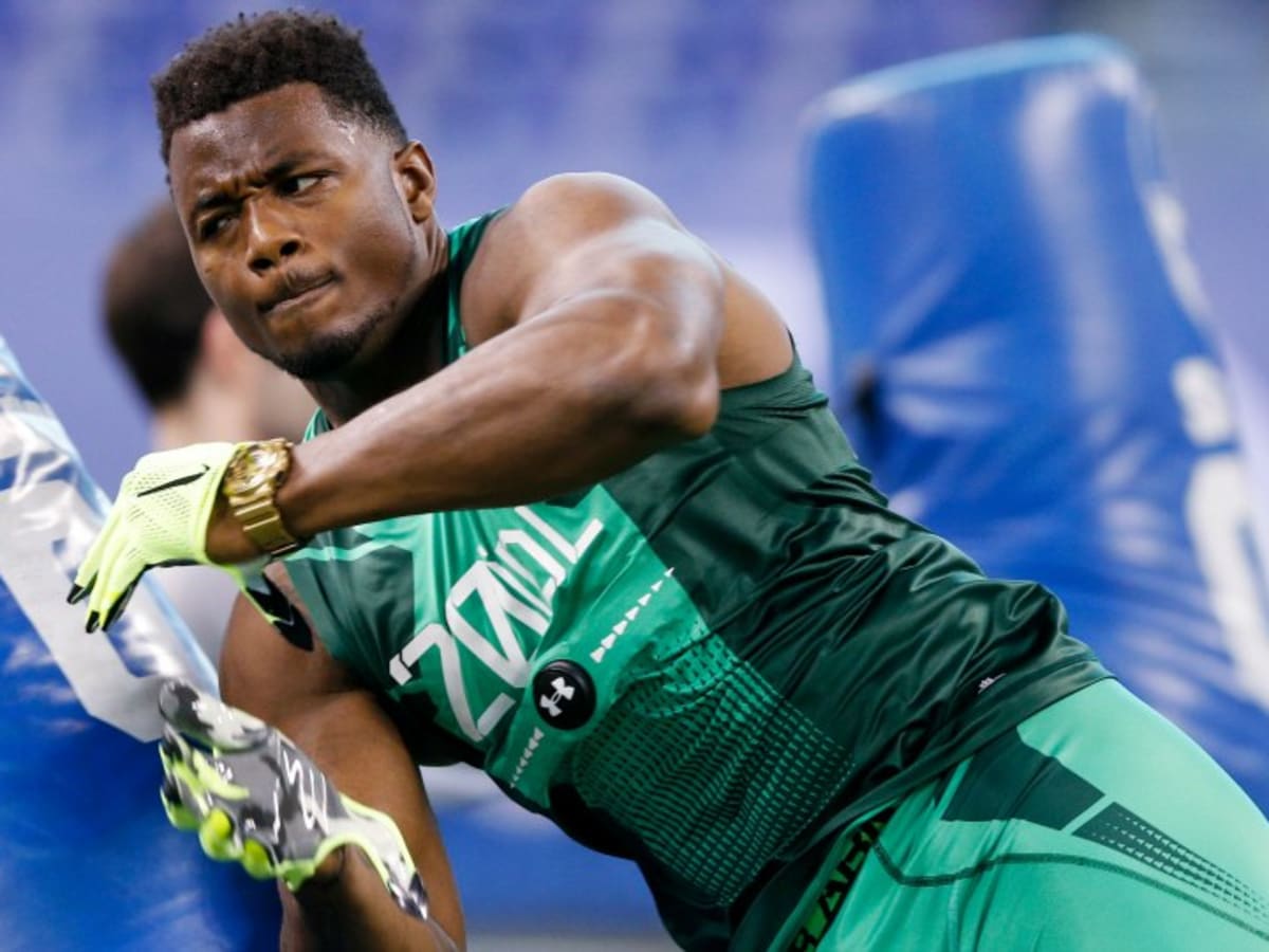 Ex-Gator Fowler sports gold watch at NFL combine, rises up draft boards