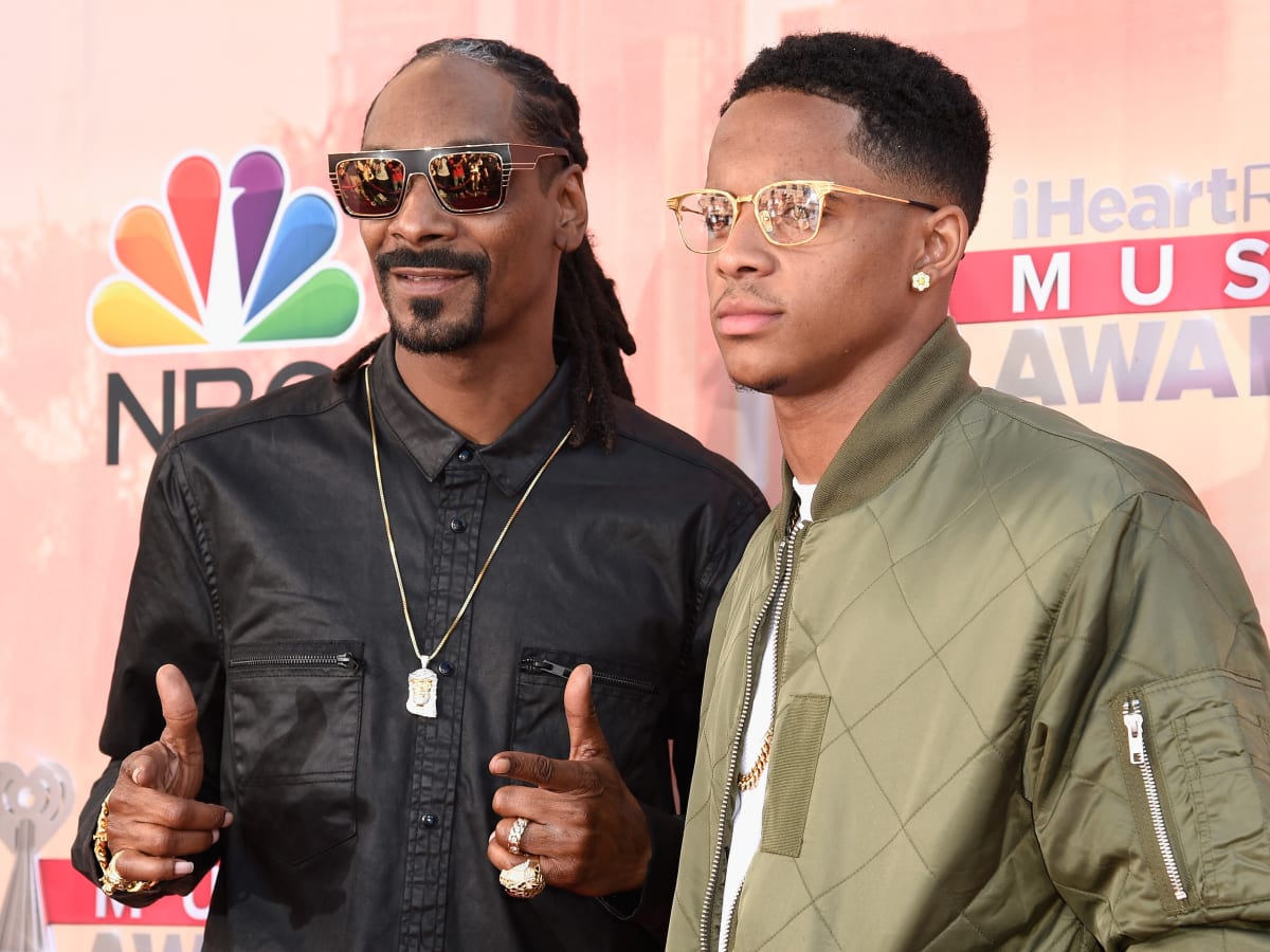 Rapper Snoop Dogg attends an NHL hockey game between Los Angeles