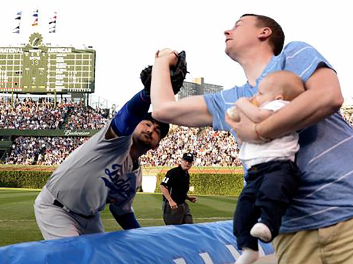 Yoink! Dad Nabs Foul Ball While Holding Baby At Cubs Game