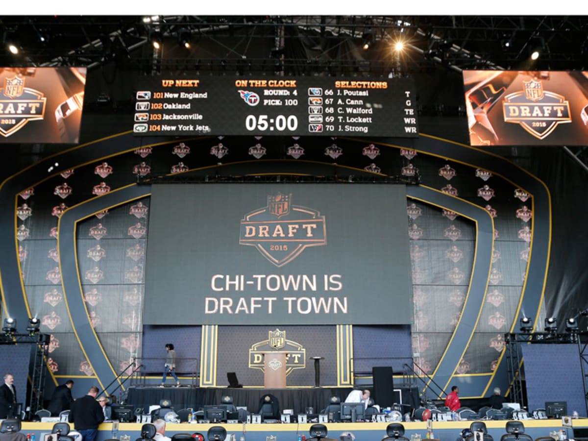 Kentucky's Bud Dupree holds his jersey after he was selected 22nd overall  by the Pittsburgh Steelers during the first round of the NFL Draft on April  30, 2015 in Chicago. Photo by