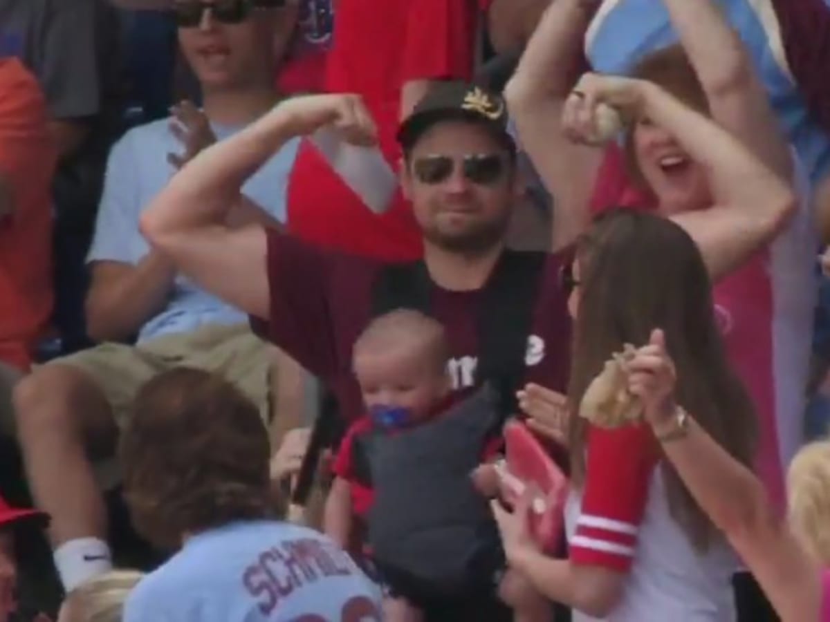 Dad With Baby Strapped To Chest Holding Beer Catches Foul Ball At