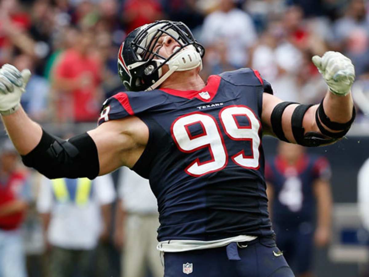 Houston Texans' J.J. Watt prepares to throw out the first pitch