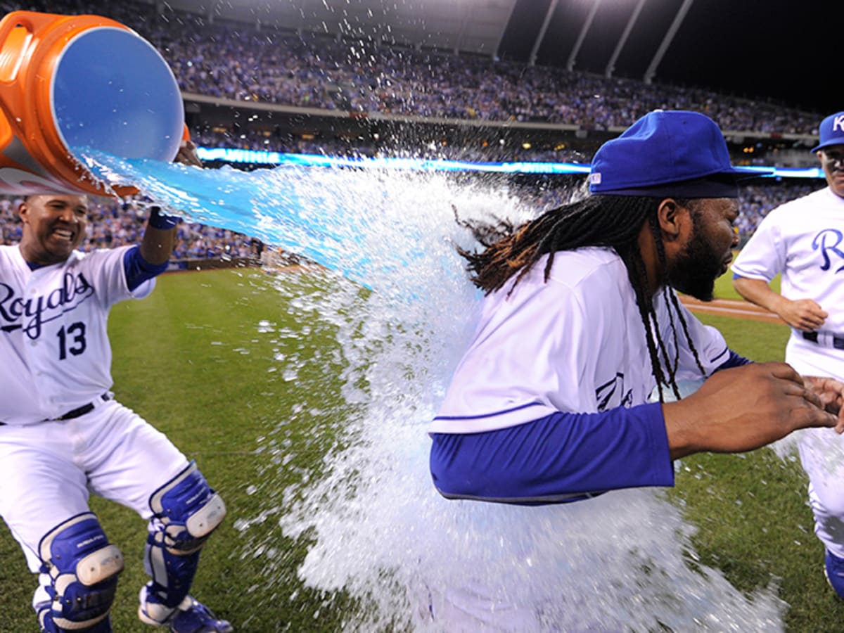 Kansas City Royals mascot Sluggerrr dons his Johnny Cueto wig for Game 2 of  the World Series on Wednesday, Oct. 28, 2015, at Kauffman Stadium in Kansas  City, Mo. (Photo by Joe