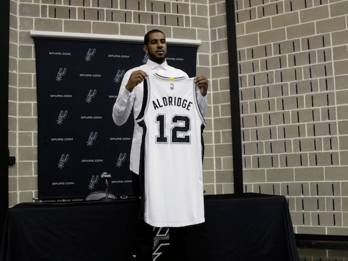 Tim Duncan not with Spurs in Orlando; focusing on Aldridge