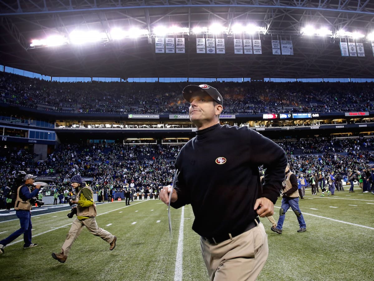 John Harbaugh denies report that family is pushing Jim Harbaugh to