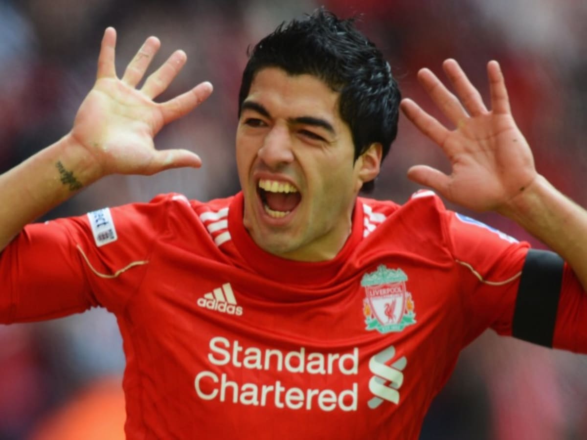 Liverpool Unloads 'The Biter,' Sending Suarez To Barca For $128 Million