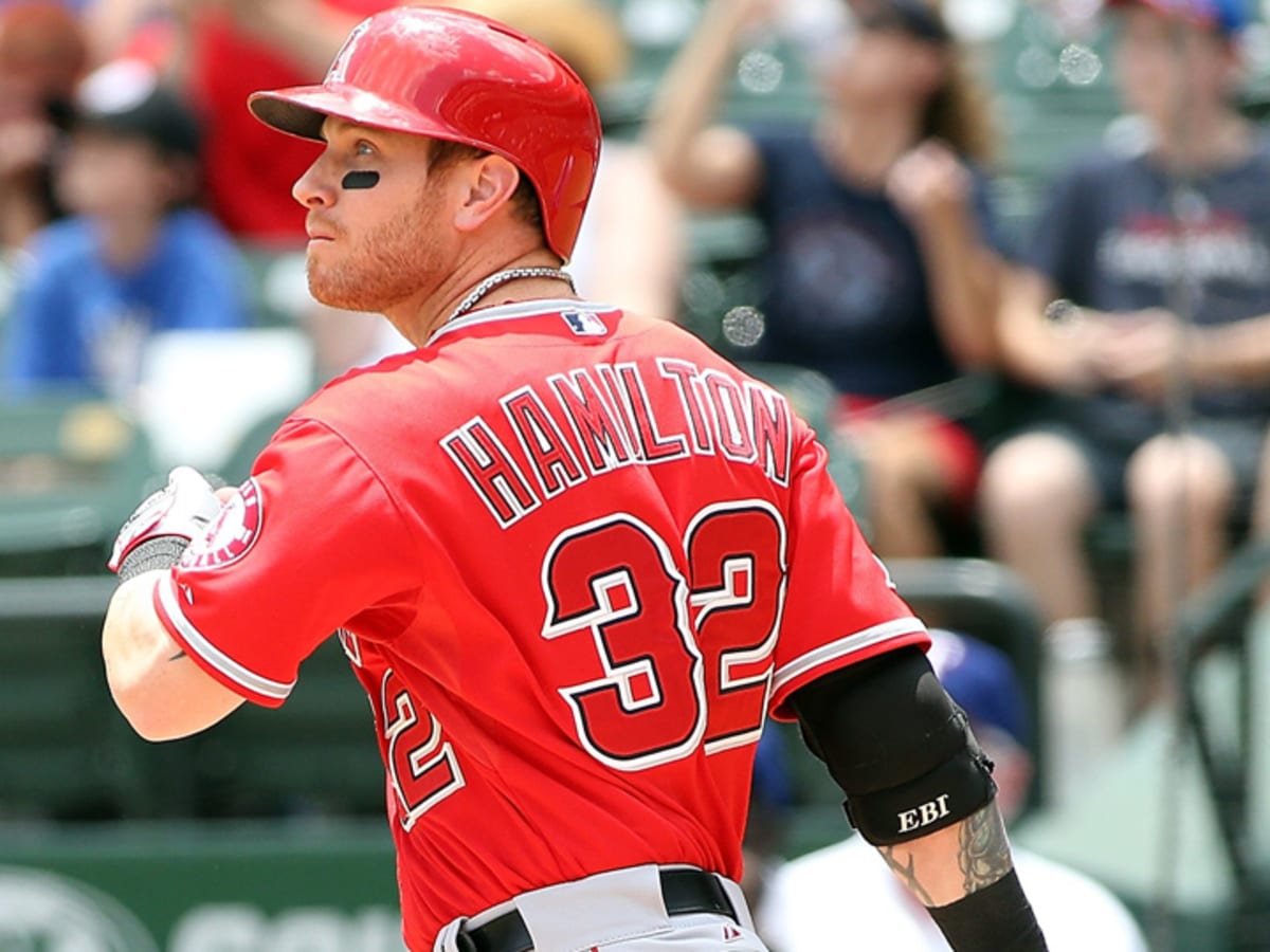 Kole Calhoun and Josh Hamilton of the Los Angeles Angels looking