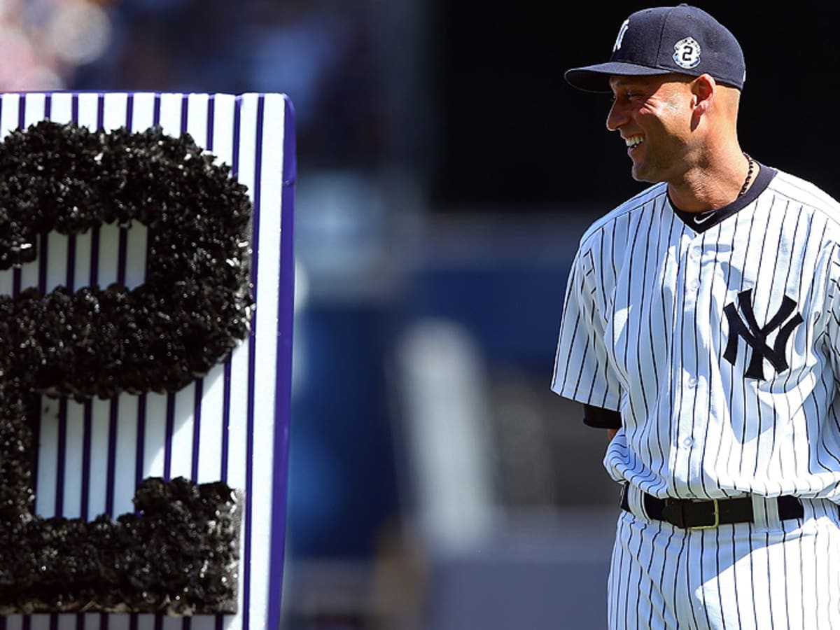 New York Yankees' shortstop Derek Jeter watches his double play