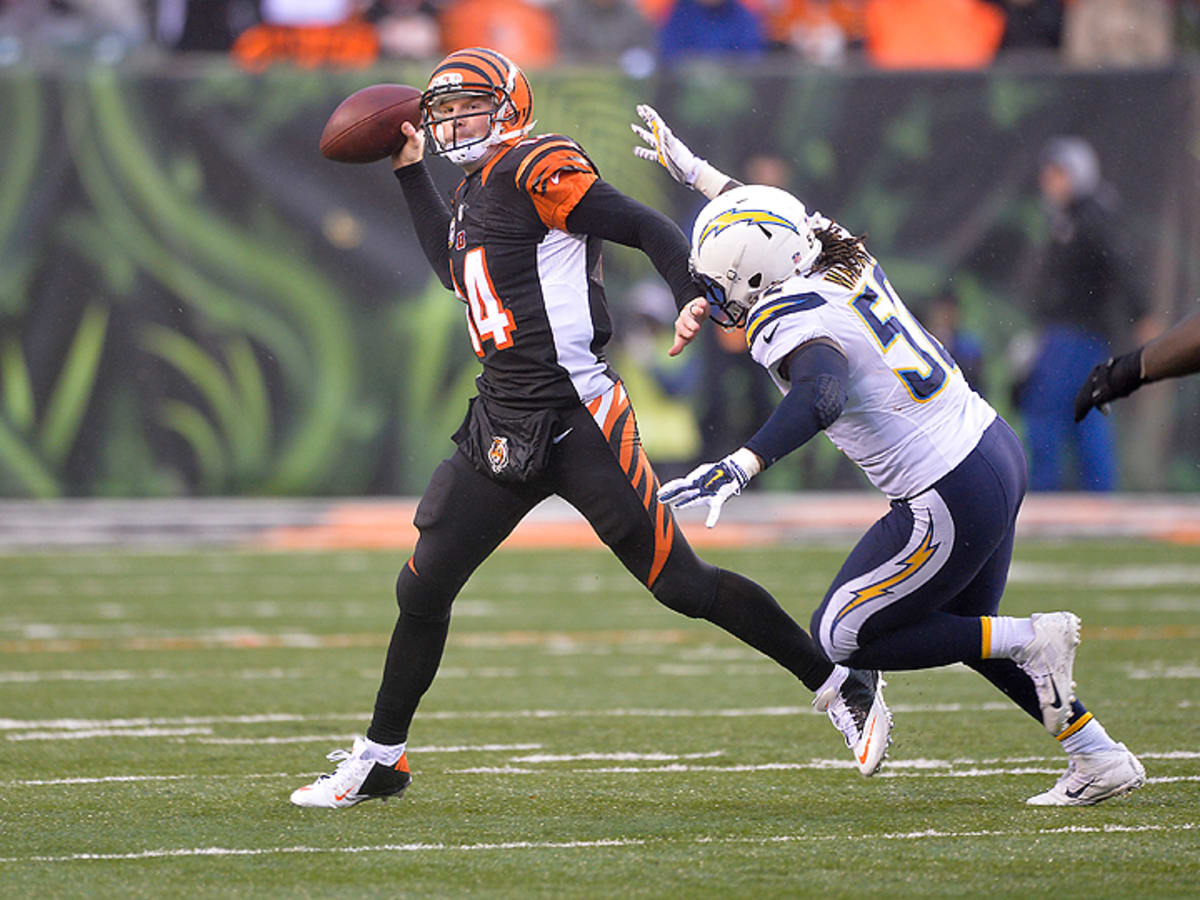 Andy Dalton of the Cincinnati Bengals attempts to break a tackle