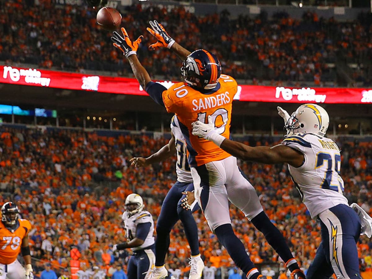 Denver Broncos wide receiver Emmanuel Sanders (10) grabs a first