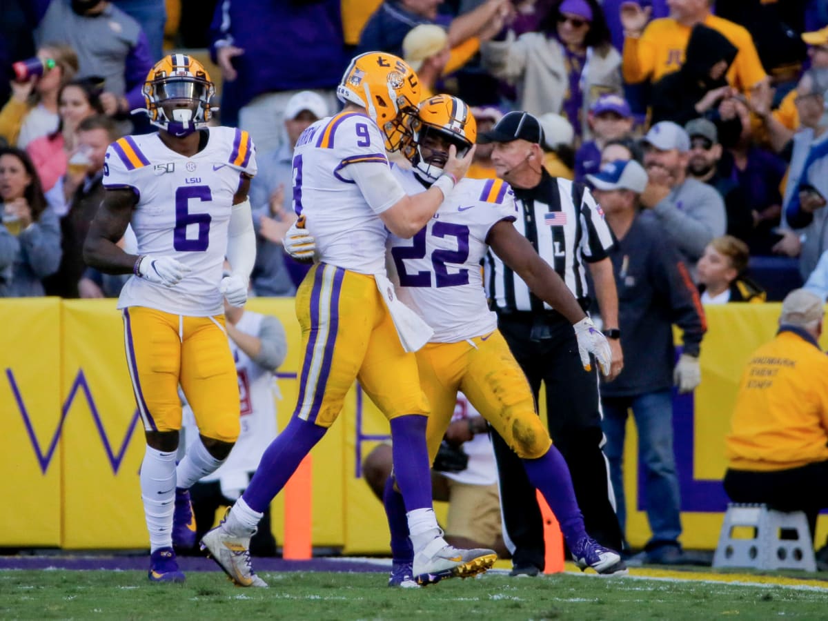 Clyde Edwards-Helaire LSU Tigers Unsigned White Jersey Reaction After  Scoring Touchdown Photograph